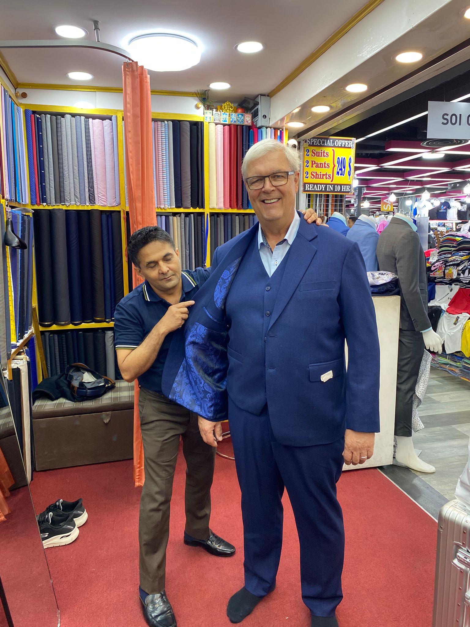 Happy client in custom tailored suit at King Fashion Uni Bangkok